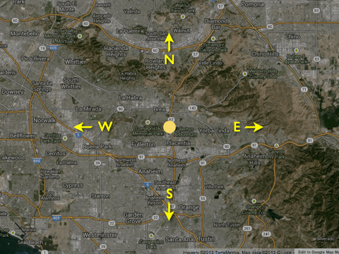 An animation showing a map with directions N E W S turning into the ground of a figure standing with a sky dome above it. The top of the dome is labeled Zenith.